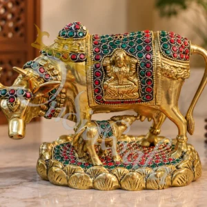 A beautifully handcrafted 6x8 Inch Brass Stone Work Kamdhenu Gifting Statue, featuring intricate stone detailing.