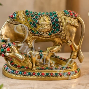 A beautiful 5x6 Inch Handcrafted Brass Stone Work Kamdhenu statue in a velvet box.