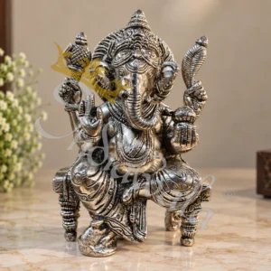 Handcrafted Silver Finish Brass Ganesha statue for corporate gifting.