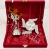 German silver swastik diya and peacock bell set in a premium velvet box