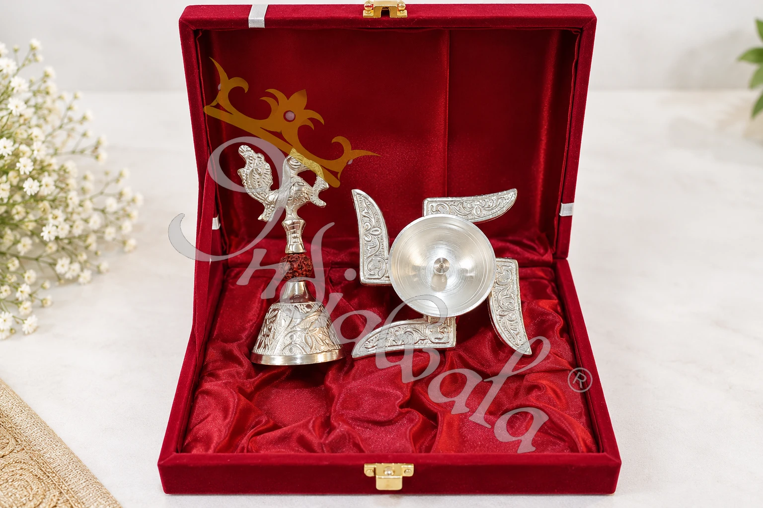 INW-9488 German silver swastik diya and peacock bell set in a premium velvet box
