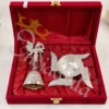 INW-9488_1 German silver swastik diya and peacock bell set in a premium velvet box