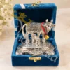 Miniature German Silver Aluminium Cow Figurine in a velvet box for gifting.