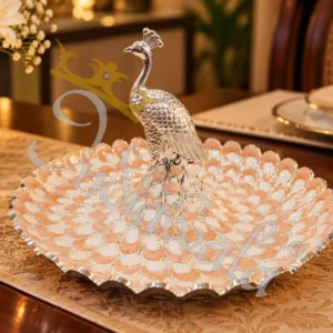An elegant 8 Inch German Silver Peacock Tray with intricate traditional engravings.